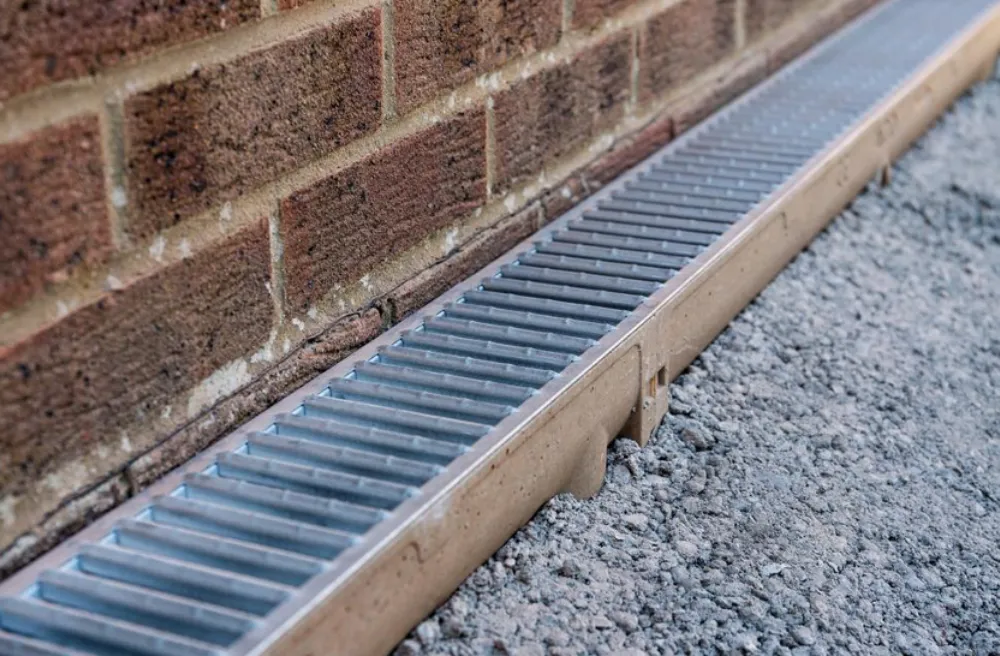 Drainage installation | drainage channel with metal grate.