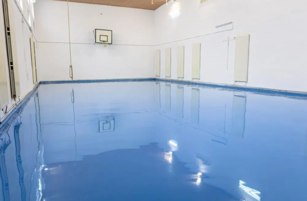 Epoxy Resin Floor | Fresh epoxy floor in a basketball court.